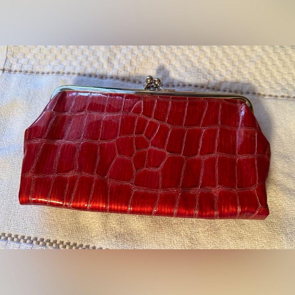 Metallic red animal print clutch